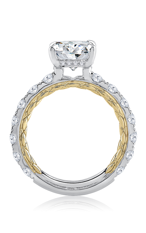 Image title A solitaire engagement ring with a large round diamond centerpiece, set in a silver band with smaller diamonds.