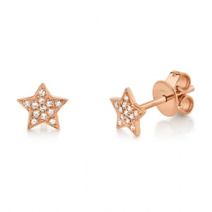 a pair of rose gold star diamond stud earrings.