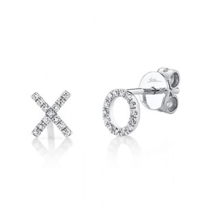 A pair of white gold XO stud earrings.