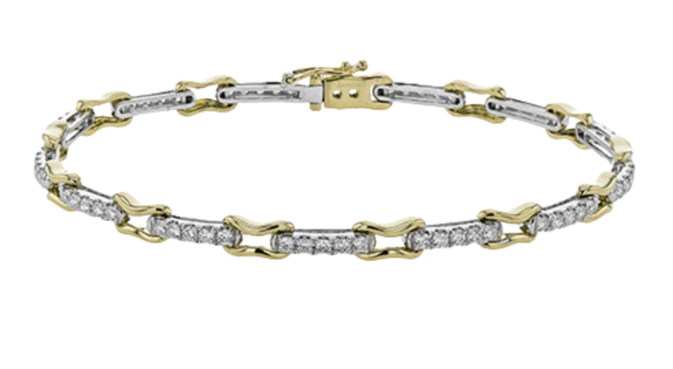 A white and yellow gold alternating chain diamond bracelet