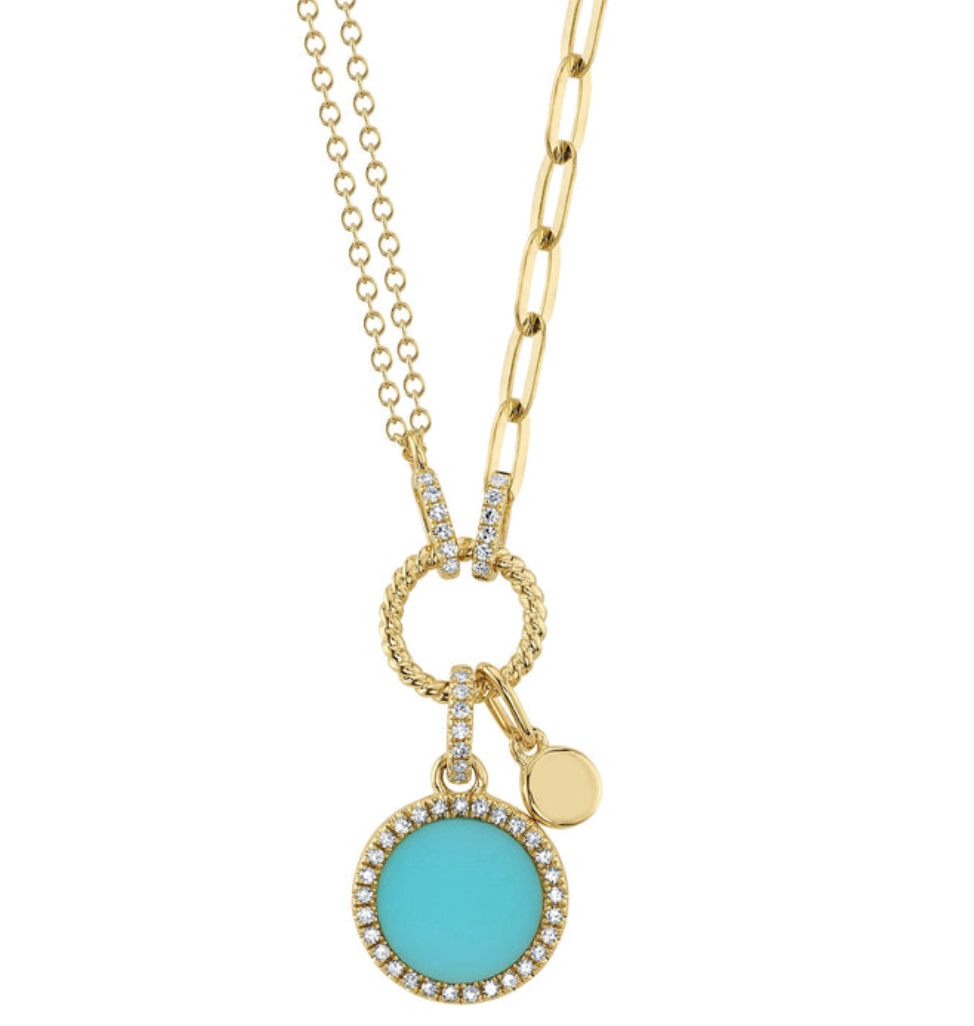 A yellow gold turquoise round necklace