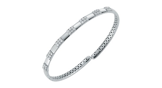 a white gold bangle bracelet with diamond accents