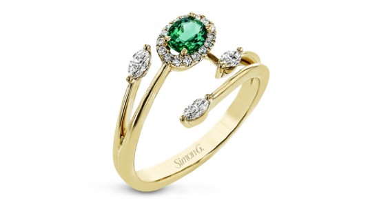 a yellow gold fashion ring featuring an emerald and diamond accents