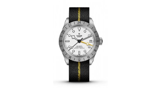 A stainless steel watch with a fabric strap, available at Exclusively Diamonds.