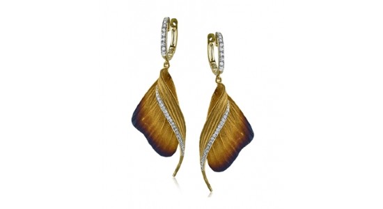 a pair of earrings that look like butterfly wings by Simon G.