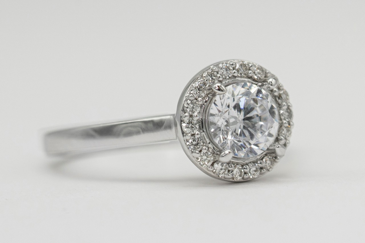 An exquisite hidden halo diamond engagement ring.