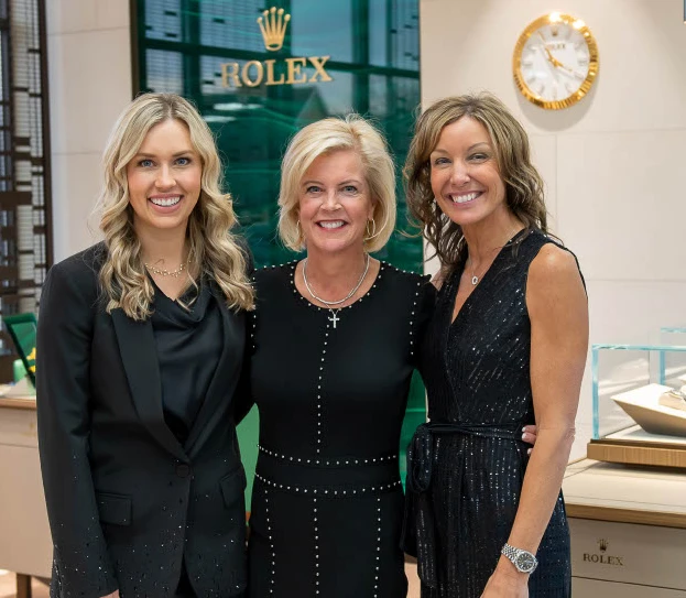 Image title Exclusively Diamonds team celebrating together in the showroom